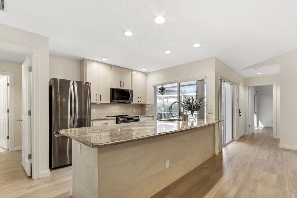 Photo of 9201 Chapman Oak Court, Palm Beach Gardens, FL 33410 (MLS # R10946212)