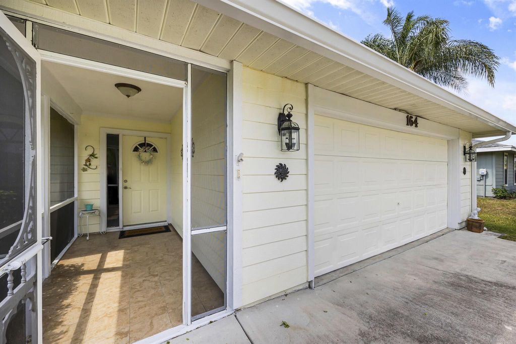 Photo of 164 SW Airview Avenue, Port Saint Lucie, FL 34984 (MLS # R10975599)