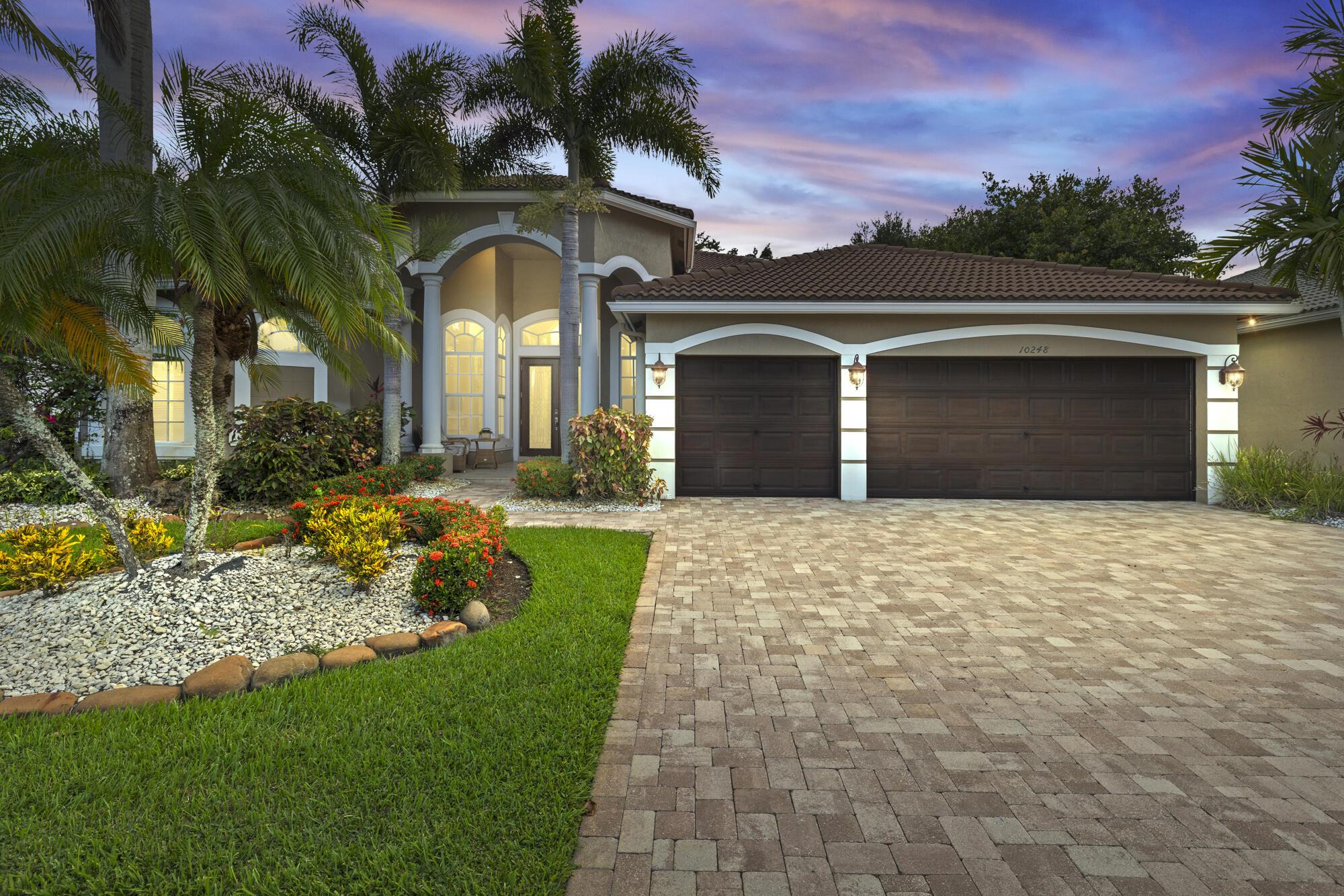 Located in the exclusive gated community of Countryside Estate. This spacious single-story residence offers over 3,000 sq ft of elegant living space, with soaring ceilings, crown molding, and a desirable split-bedroom layout.Step outside to a resort-style backyard with a heated pool and spa, screened-in patio, Tiki bar, built-in grill, and lush tropical landscaping--designed for relaxation and entertainment.Ideally situated just minutes from the Wellington International Horse Showgrounds, and with easy access to the Turnpike and major highways, this location makes commuting to Palm Beach, Fort Lauderdale, or Miami seamless--perfect for equestrian enthusiasts and professionals on the go.