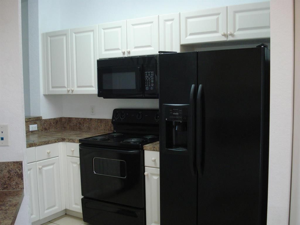 Photo of 3628 Oleander Terrace, Riviera Beach, FL 33404 (MLS # R10812066)