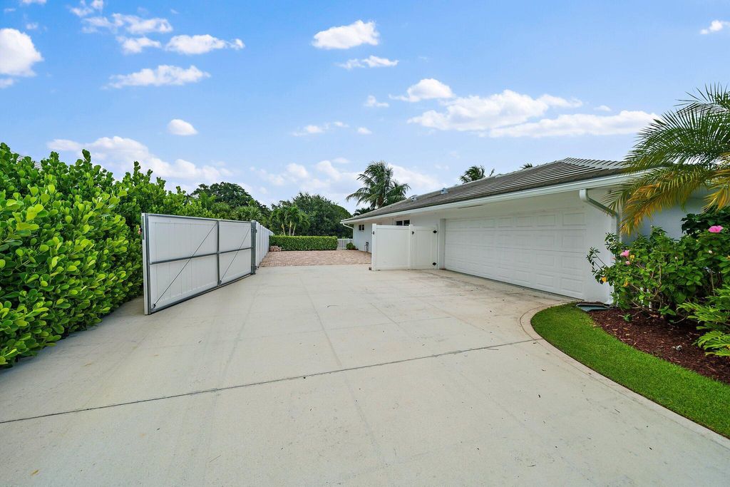 Photo of 98 Golfview Drive, Tequesta, FL 33469 (MLS # R10963556)