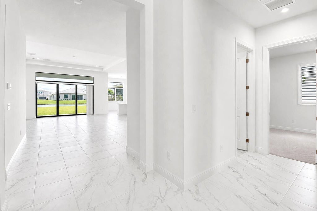 Photo of 8295 SW NORCIA Way, Port Saint Lucie, FL 34987 (MLS # B26087076)