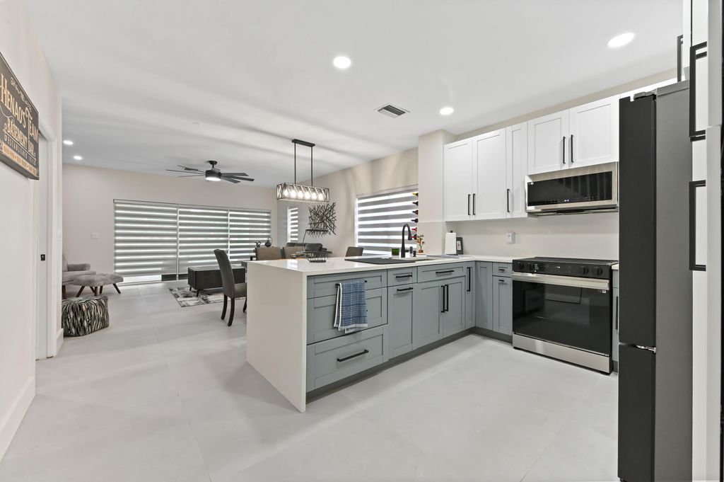 Photo of 6880 Brook Hollow Road, Lake Worth, FL 33467 (MLS # B26023936)