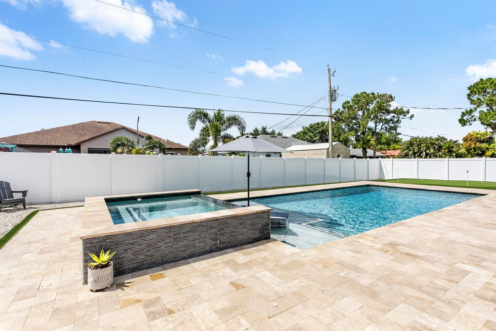 Photo of 1042 SW John Maccormack Terrace, Port Saint Lucie, FL 34953 (MLS # R11099030)