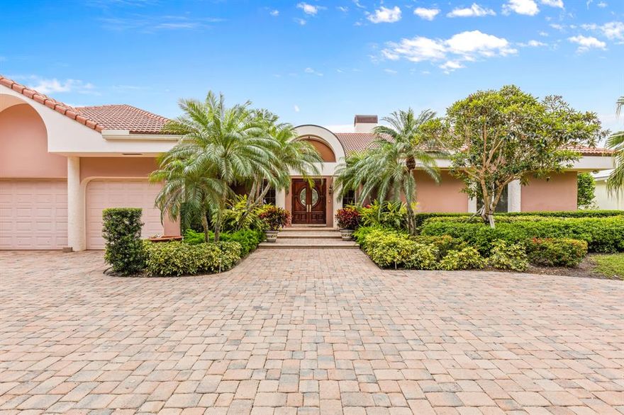 This is a boater's dream home - large, comfortable light & bright rooms, an over-sized beautiful pool, and gorgeous water views. This 6 bedroom 6 bath home will stand out as an A+ location in which to live and entertain. Keep your large boat behind the home and enjoy how easy it is - just a few minutes - to get to the Intracoastal Waterway, while the enormous glassed-in patio helps entertain when the weather outside is not ideal for boating or swimming. The master bedroom, one guest bedroom and one office/convertible bedroom are conveniently located downstairs, and there are three more guest bedrooms upstairs. A stunning view from the upstairs balcony helps complete the picture.