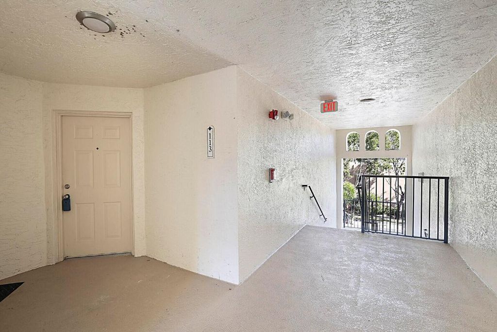 Photo of 100 Crestwood Court N #113, Royal Palm Beach, FL 33411 (MLS # R11154061)