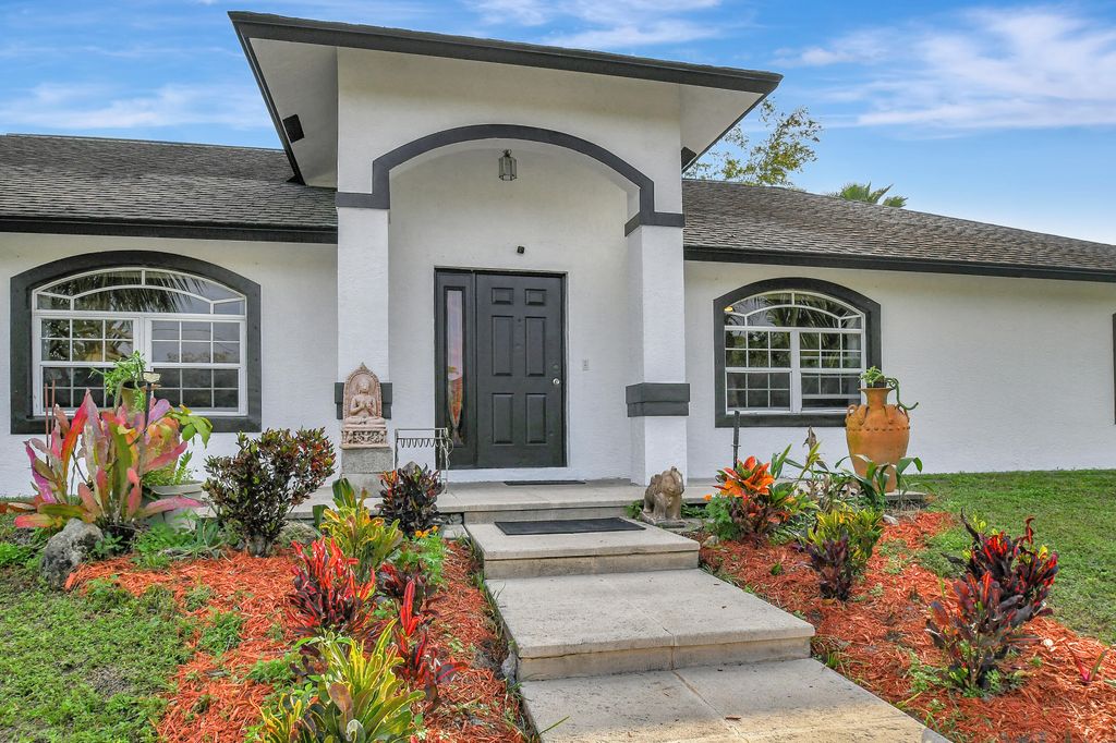 Photo of 3446 Cabbage Palm Way, Loxahatchee, FL 33470 (MLS # R11056882)