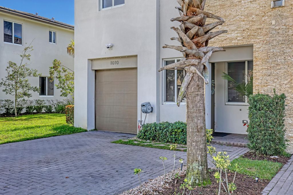 Photo of 1010 Pioneer Way, Royal Palm Beach, FL 33411 (MLS # R11167806)