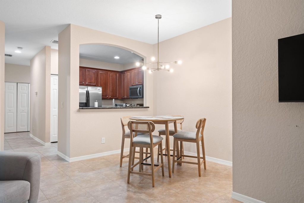 Photo of 4861 Bonsai Circle #101, Palm Beach Gardens, FL 33418 (MLS # R11066353)