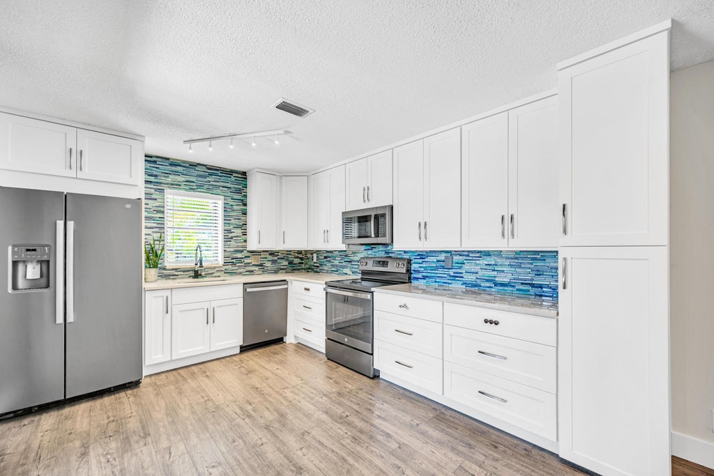 Photo of 2629 NW 99th Avenue #2629, Coral Springs, FL 33065 (MLS # B26045373)