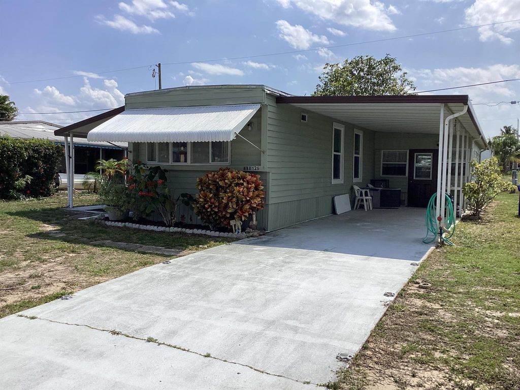 Photo of 8126 SE Wren Avenue, Hobe Sound, FL 33455 (MLS # R10989141)