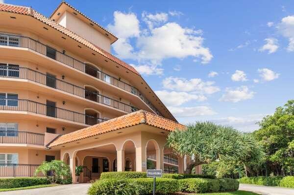Exquisitely upgraded 2 bedroom first floor corner condo with long view of marina and intracoastal waterway. Kitchen is open to the living area with large island, granite countertops and stainless steel appliances. Gorgeous 30'' white porcelain tile floors throughout the living area. Updated baths. Covered and screened rear patio and large sundeck that has spectacular views over the marina and intracoastal waterway. Seasonal rental. Master bedroom has a queen size bed and the second bedroom has a full size bed. There is a dedicated covered parking space below the unit.Also Available for Annual Rent.