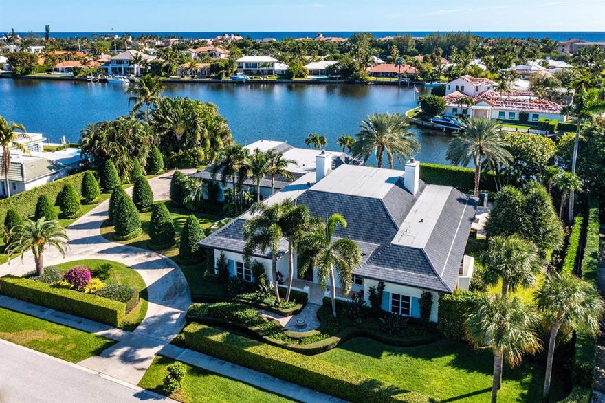 1500 Lands End is an incredible opportunity to own one of the largest and rarest lots in Point Manalapan. Your Beautiful Seaside Estate is sited on nearly 30,000 sqft featuring over 200ft of water-frontage, an 80ft dock and sprawling across roughly 4400 living sqft. The lush, mature landscaping, private pool, serene water views & French Bermuda style architecture captivate all you are looking for with coastal, island living. Enjoy your built-in Summer Kitchen, spacious 3-car garage, oversized circular driveway, whole house generator & high impact hurricane windows and doors throughout.