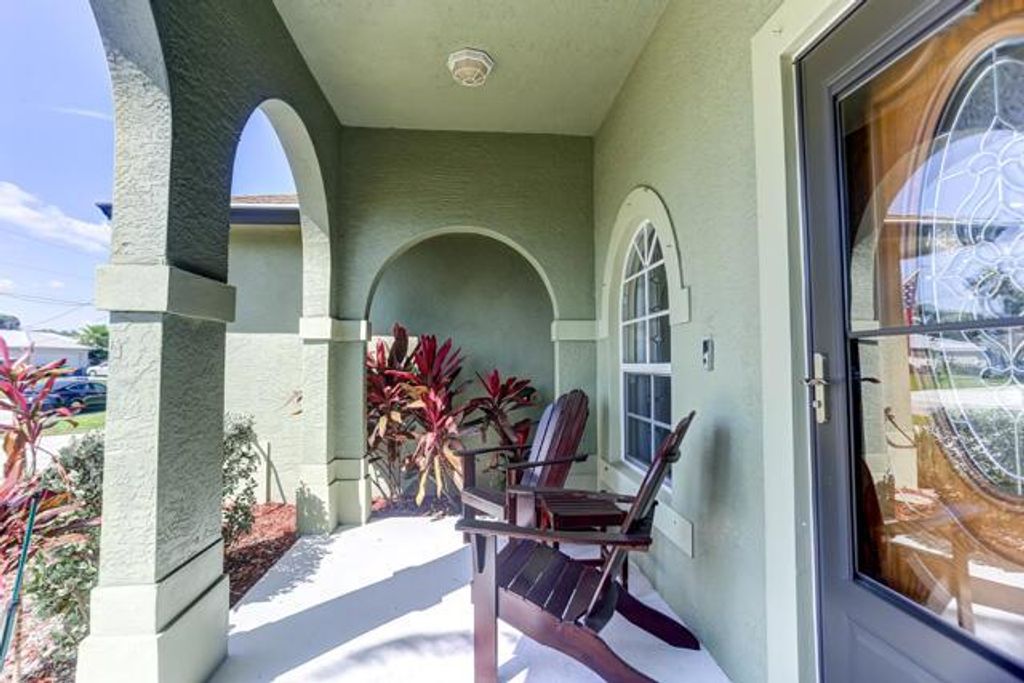 Photo of 941 SW Fable Avenue, Port Saint Lucie, FL 34953 (MLS # R10970225)