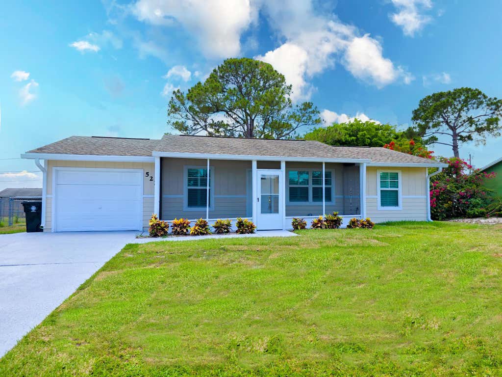 Photo of 522 SW Todd Avenue, Port Saint Lucie, FL 34983 (MLS # R10995813)