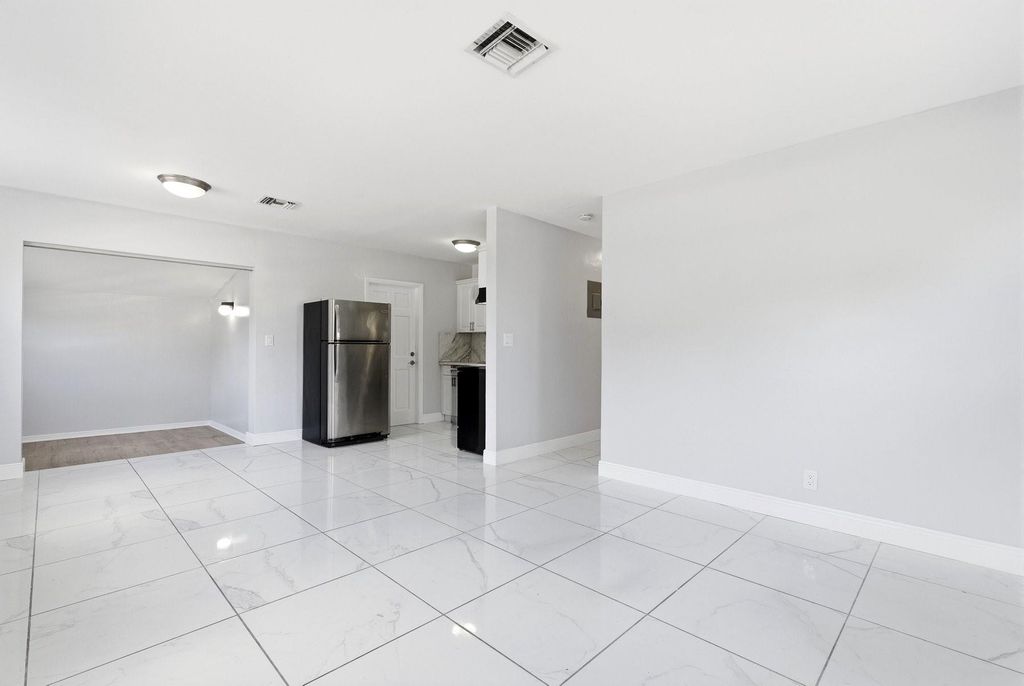 Photo of 5961 NW 42nd Avenue, Fort Lauderdale, FL 33319 (MLS # F10552738)