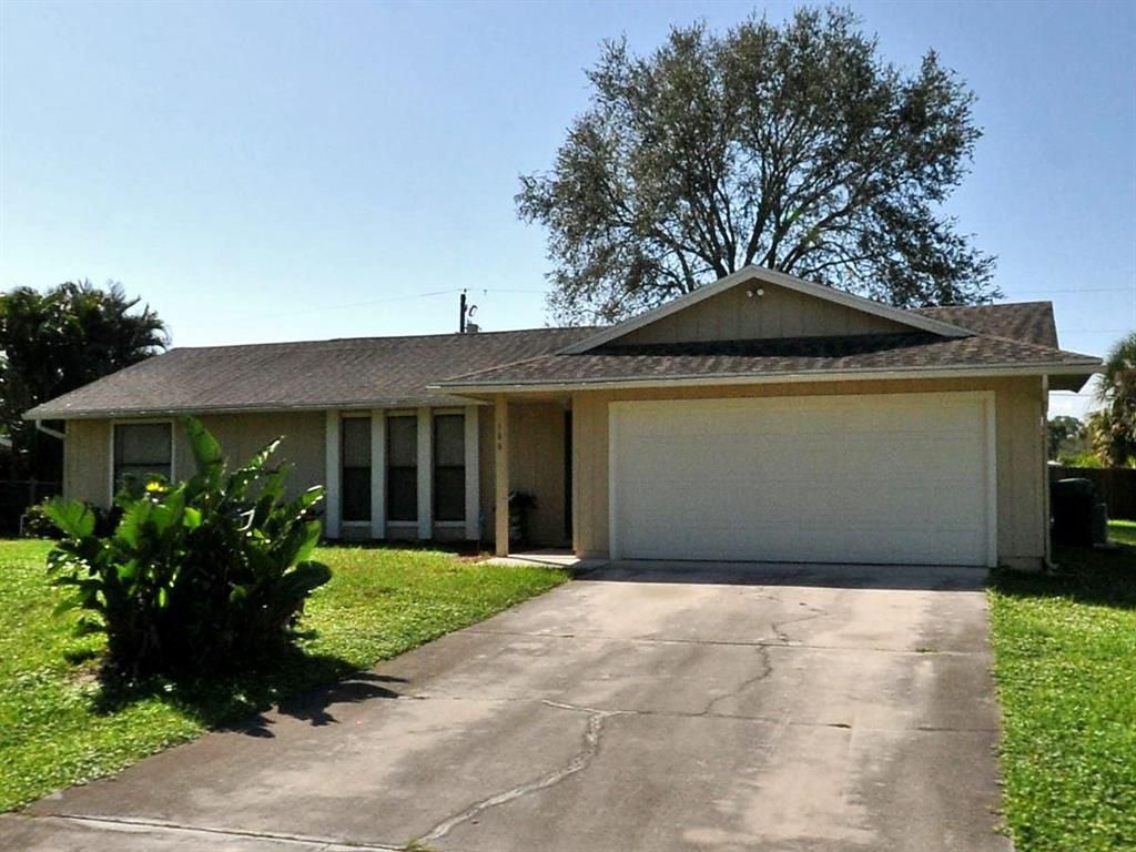 Photo of 166 SW Ray Avenue, Port Saint Lucie, FL 34953 (MLS # R10751846)