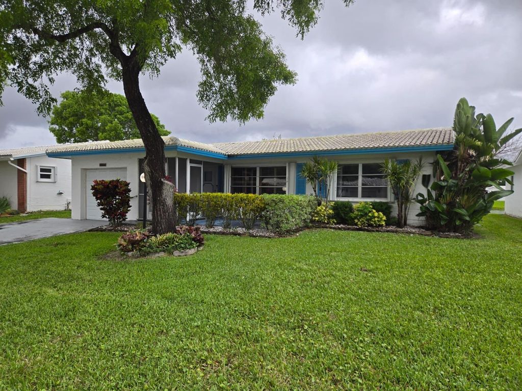 Photo of 1124 NW 90th Way, Plantation, FL 33322 (MLS # B26023873)