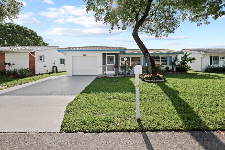 LAUDERDALE WEST; 55+ Community. 2/2 w/garage single family home, WATERFRONT. Front/rear patios, gorgeous custom kitchen w/huge bar style quartz top, accordion shutters thru-out and new impact garage door, double wide concrete driveway, french doors overlooking wide water. Just under 1700sq ft of living area. 2 heated pools, spa, gym, tennis courts, saunas, professional shows, social clubs, free films shown on wide screen, wood working shop, arts & crafts, free shuttle service at your door and much more! Maintenance covers outside painting, roof repair/replace, basic cable/internet, and lawn service. Close to shopping and many restaurants. Min credit score 700. Easy to show (MORE PHOTOS COMING THIS WEEK).