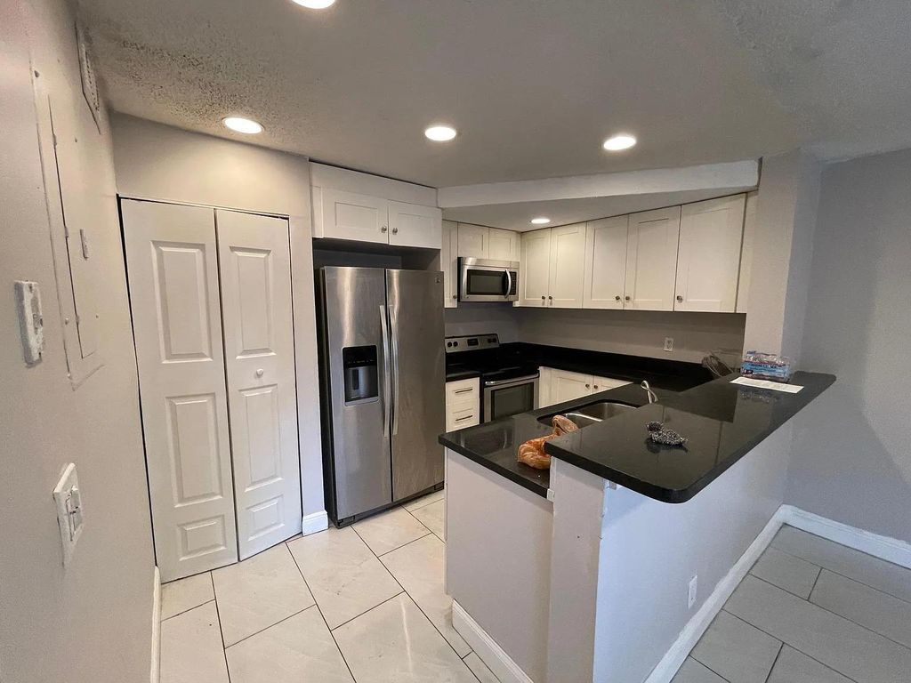 Photo of 5844 Blueberry Court #Unit 68, Lauderhill, FL 33313 (MLS # B26007344)