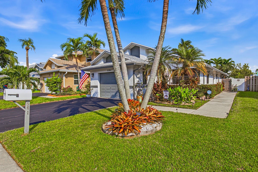 Photo of 501 Lakeside Circle, Sunrise, FL 33326 (MLS # B26086187)