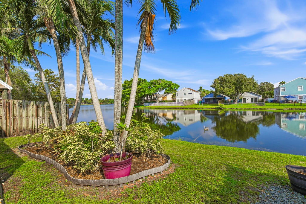 Photo of 501 Lakeside Circle, Sunrise, FL 33326 (MLS # B26086187)