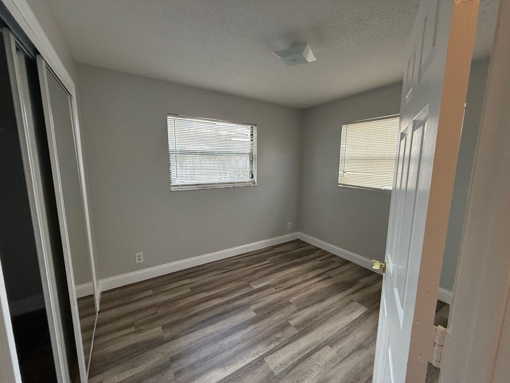 Photo of 2003 A Isaacs Avenue, West Palm Beach, FL 33407 (MLS # F10556144)