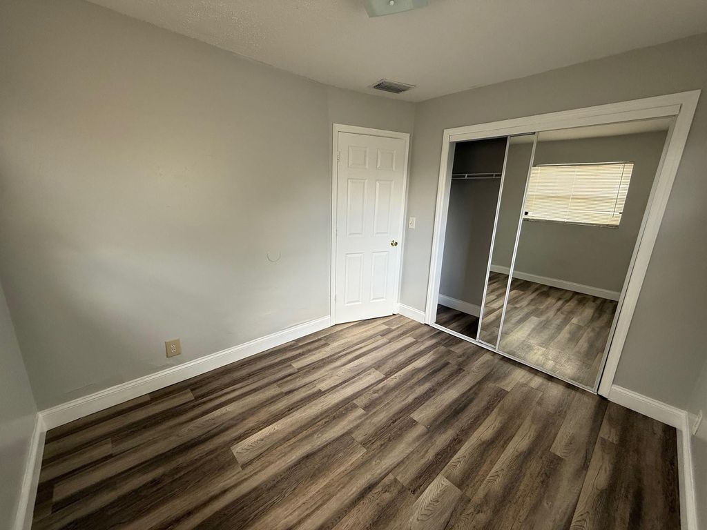 Photo of 2003 A Isaacs Avenue, West Palm Beach, FL 33407 (MLS # F10556144)