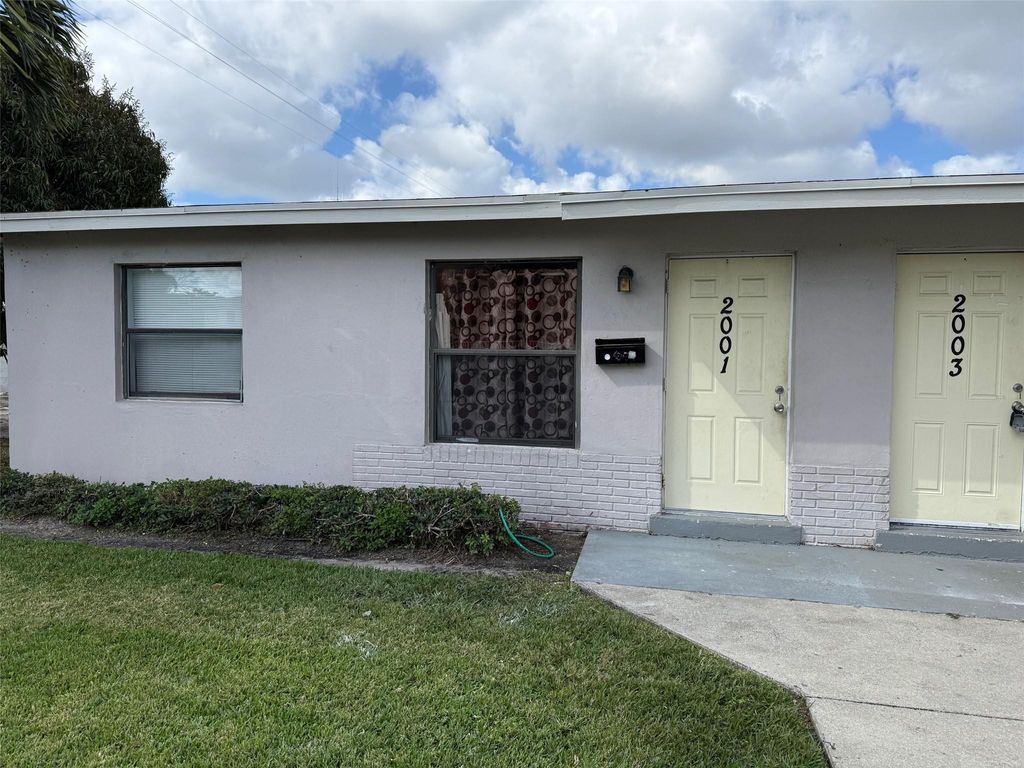 Photo of 2003 A Isaacs Avenue, West Palm Beach, FL 33407 (MLS # F10556144)