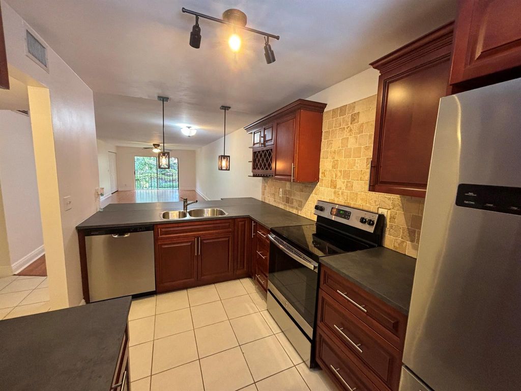 Photo of 2895 SW 22nd Avenue #2060, Delray Beach, FL 33445 (MLS # R11104595)