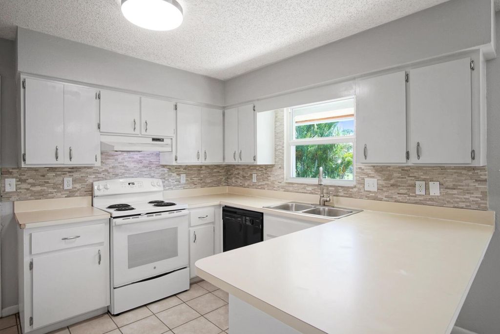 Photo of 4903 Sunset Boulevard, Fort Pierce, FL 34982 (MLS # R11099872)