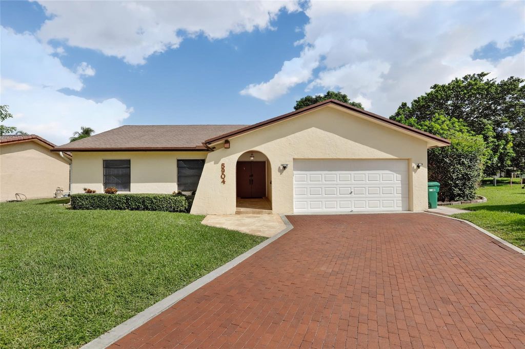 Photo of 5904 Blue Beech Ct, Tamarac, FL 33319 (MLS # F10532911)
