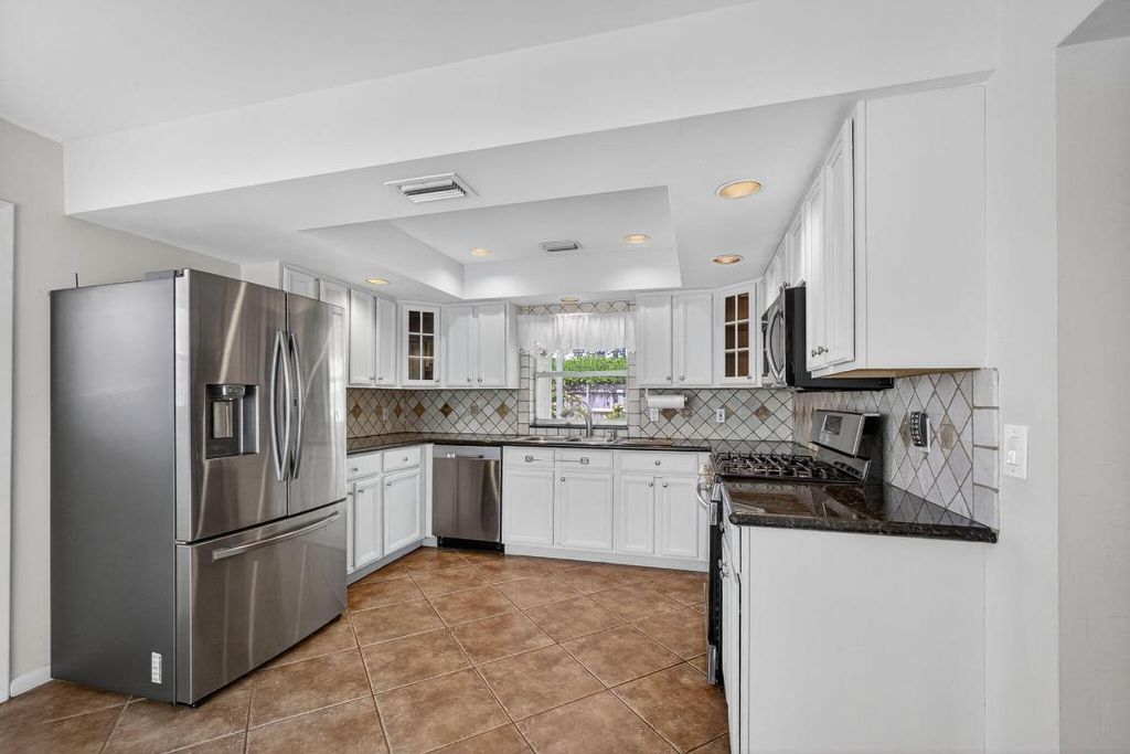 Photo of 4359 Gardenia Drive, Palm Beach Gardens, FL 33410 (MLS # R11125321)