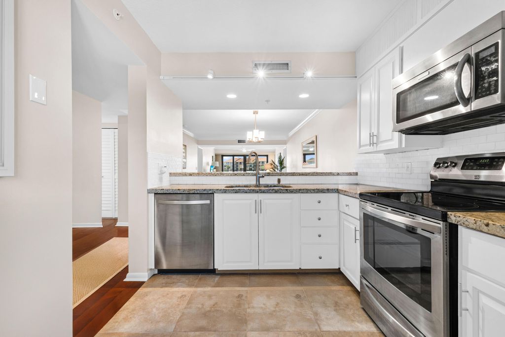 Photo of 1501 Marina Isle Way #305, Jupiter, FL 33477 (MLS # B26008193)
