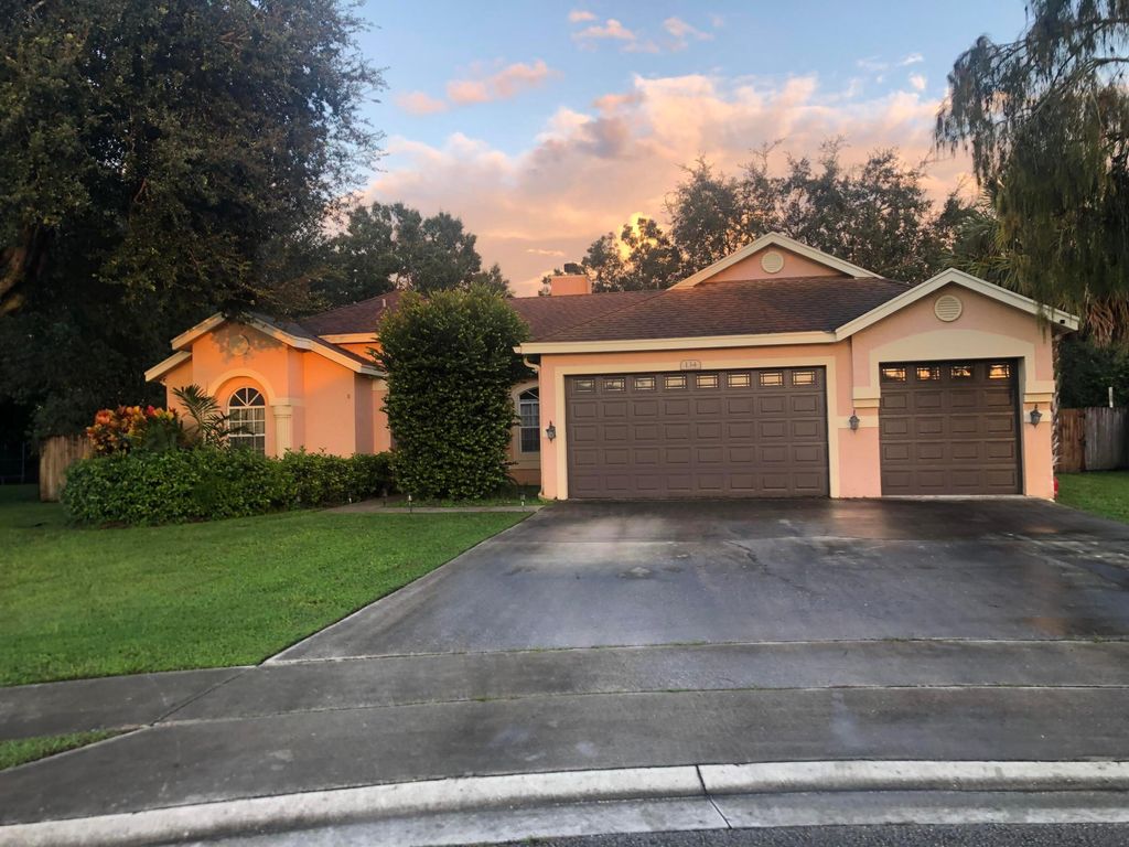 Photo of 134 Nottingham Road, Royal Palm Beach, FL 33411 (MLS # R10926099)