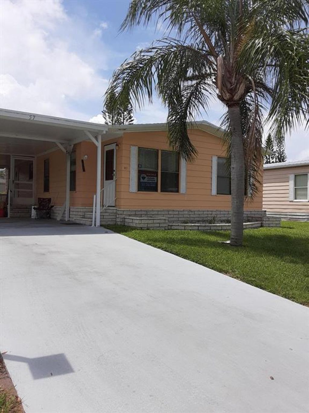 Photo of 57 Vista De Laguna, Fort Pierce, FL 34951 (MLS # R10743146)
