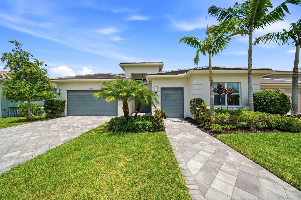 Photo of 11770 SW Coronado Springs Drive, Port Saint Lucie, FL 34987 (MLS # B26064295)