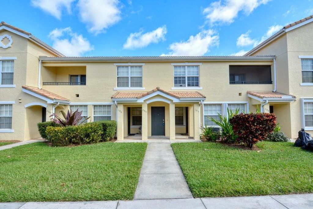 Photo of 130 SW Peacock Boulevard, St Lucie West, FL 34986 (MLS # R10883995)