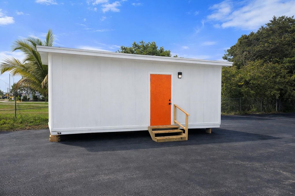 Photo of 5635 W Hallandale Beach Boulevard, West Park, FL (MLS # B26011355)