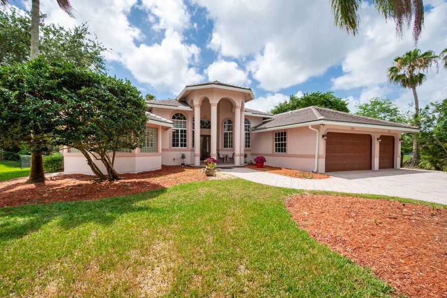 Price reduced! Discover homestead living in Falcon Estates, Plantation Acres! This 6-bed (or 5 + office), 4-bath pool home sits on a private cul-de-sac and offers two en suites, a split floor plan, soaring ceilings, and abundant natural light. Enjoy marble and hardwood floors, an updated kitchen with stainless appliances and induction range, plus a NEW tile roof and NEW A/C.The fully fenced backyard is your private oasis—lush landscaping, sparkling pool, and plenty of space to relax or entertain. Close to American Heritage, Sawgrass Mills, parks, dining, and major conveniences.Tranquil, elegant, and move-in ready—perfect for long-term living!