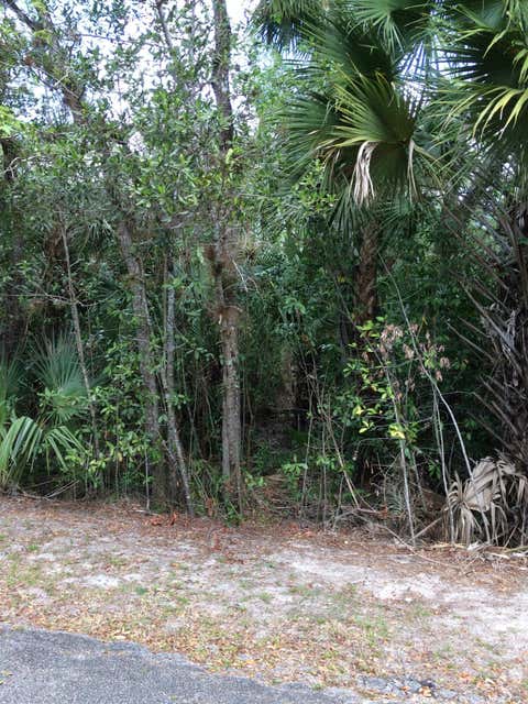 Photo of 1802 Old River Road, Fort Pierce, FL 34982 (MLS # B26045536)