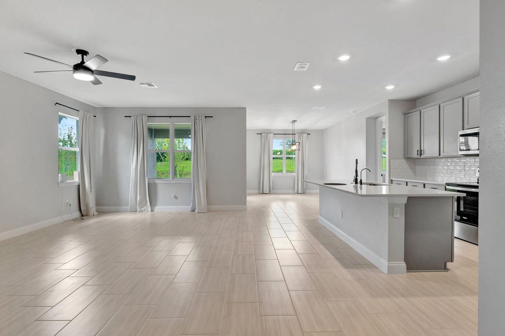 Photo of 8606 DAHLIA Circle, Port Saint Lucie, FL 34986 (MLS # B26071090)