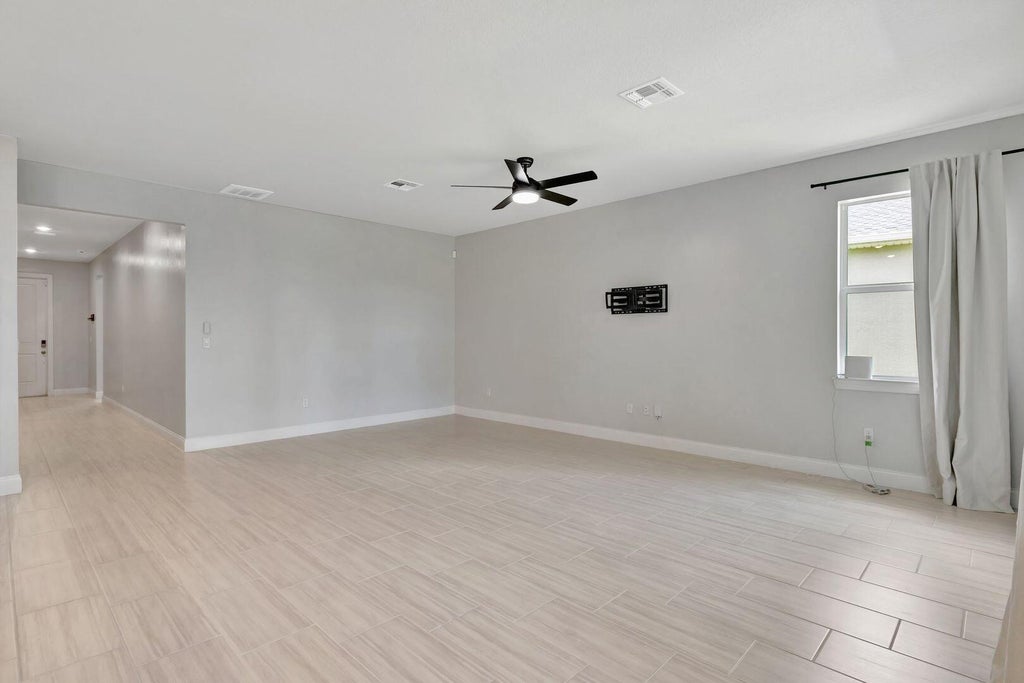Photo of 8606 DAHLIA Circle, Port Saint Lucie, FL 34986 (MLS # B26071090)