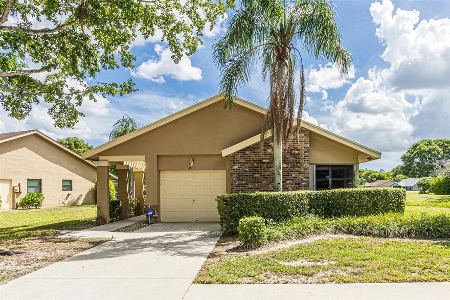 Single family home on one of the largest waterfront lots. Corner location with water on two sides. 1 car garage. Tile in living areas. Large eat-in kitchen with breakfast area and garden window. Open floor plan. Split bedrooms. Master bedroom has huge walk-in closet. Den can be third bedroom adding a closet. Enclosed Florida room. Huge screened patio full width of home. Accordion shutters. Pull down  stairs in garage. 177 homes in community. No rentals. No children under 18. 2 pets allowed-maximum 35 lbs. each. No trucks. Maintenance includes exterior painting, cable, lawn maintenance and irrigation services. Clubhouse on site with heated pool. Use of resort Township amenities across the street include olympic-size pool, kiddie pool and bocce courts. Close to major highways and shopping.