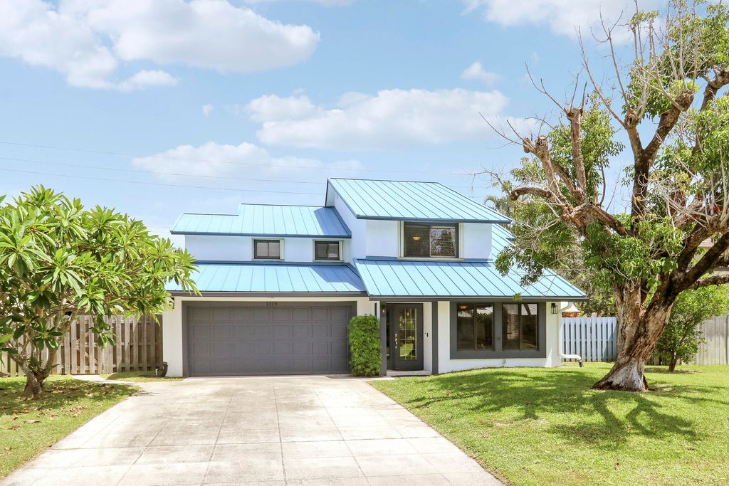 Photo of 1119 RAINWOOD Circle W, Palm Beach Gardens, FL 33410 (MLS # B26052809)