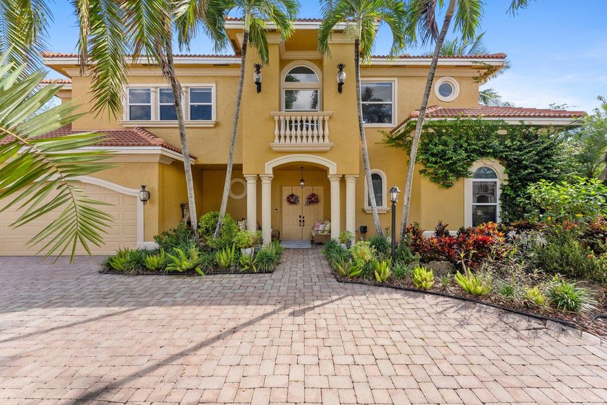 Welcome to this stunning courtyard home with 1/1 separate guest house in Parkland's gated community of Heron Bay. Beauty and modern comfort await you as you enter the private courtyard with pool/spa and into the meticulous, light filled main residence with 4 beds/4 baths .The renovated chef's kitchen showcases custom quartzite counters with large 7 foot island with built in wine refrigerator and prep sink, GE Monogram appliances. Primary bedroom on main floor and 3 additional bedrooms upstairs with a loft. Home boasts additional features including impact windows and doors, 2022 roof, 2 newer AC units, new pond fed irrigation pump, large, fenced in corner lot, entire house water softener and computerized motor shades in family room. Community offers resort pool, clubhouse, tennis and more.