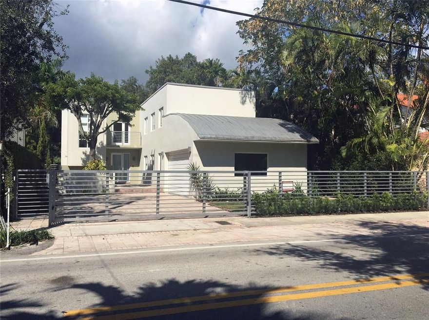 Stunning Newly Renovated 2 story home in"North Grove" w/4 bed/3.5 bath.-Over 3622 sf under A/C- Dramatic & light filled open living spaces w/volume ceilings & large French doors overlooking to private pool & large patio-Spectacular new high-end kitchen w/island, quartz countertops, eat in kitchen, S/S appliances & wine refrigerator--Beautiful Master Suite w/private large balcony. Gorgeous Master bathroom w/shower & tub, large walking closet. 1 suite downstairs - 3 Balconies -2 car garages & gated driveway