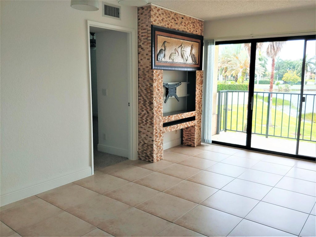Photo of 1760 WINDORAH Way #F, West Palm Beach, FL 33411 (MLS # B26076452)