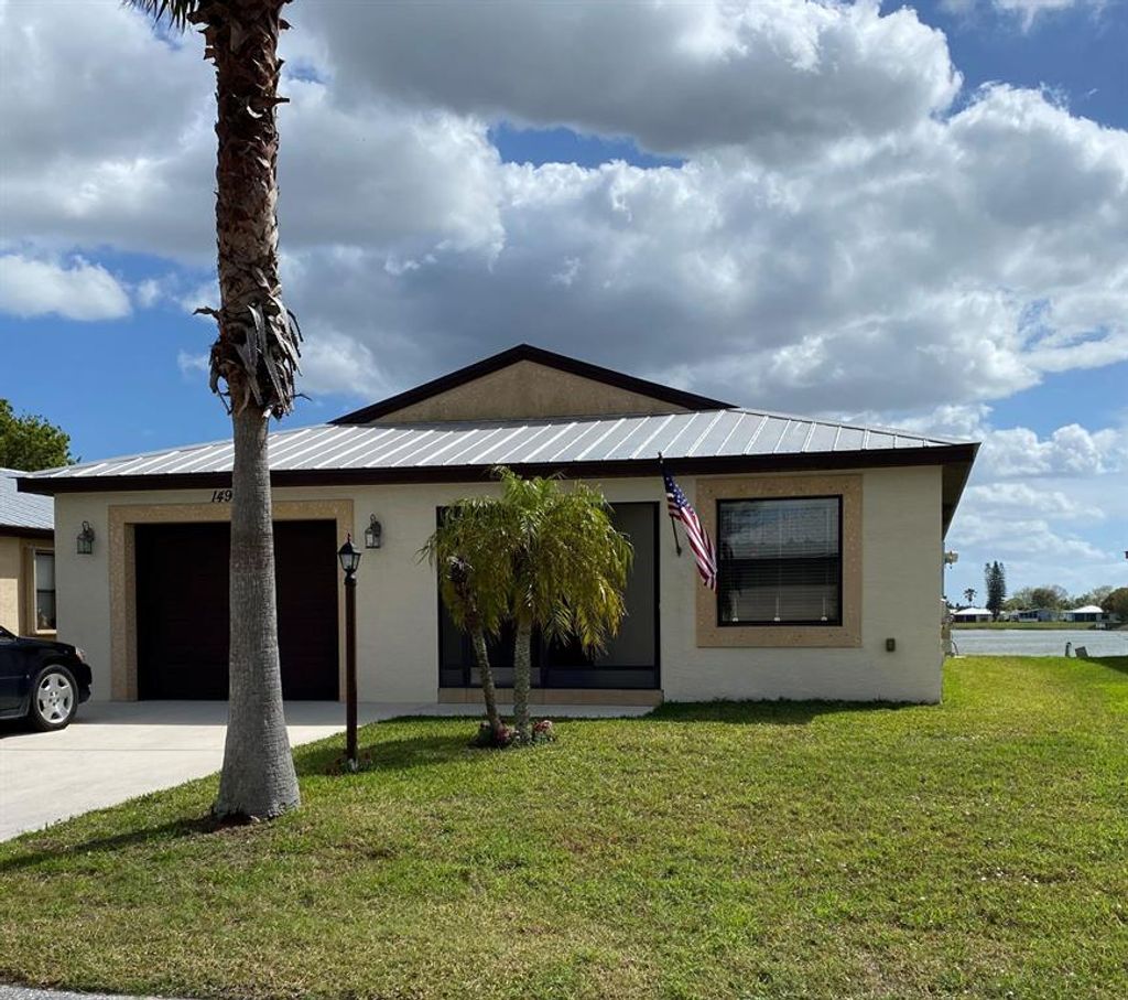 Photo of 14927 N Tucan St, Fort Pierce, FL 34951 (MLS # R10867123)