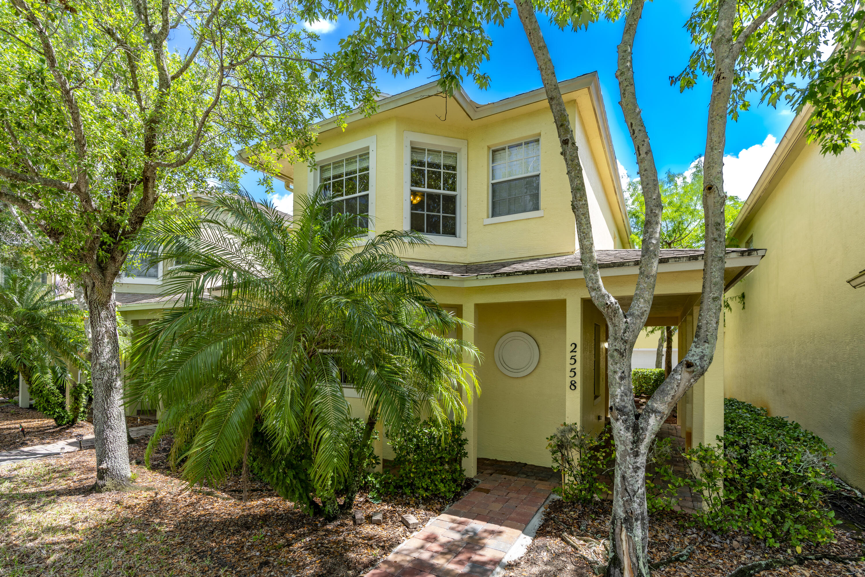 Welcome to East Lake Village! Experience modern comfort and style in this charming two-story home, boasting 3 bedrooms and 2.1 bathrooms. The property features brand-new laminate flooring throughout, adding a touch of sophistication to every room. The kitchen shines with stainless steel appliances and elegant granite countertops, perfect for culinary enthusiasts. Ideally situated near St. Lucie Medical Center, scenic parks, delightful restaurants, and the beautiful Jensen Beach, this home offers the perfect blend of convenience and lifestyle. Don't miss the opportunity to make this home your own!